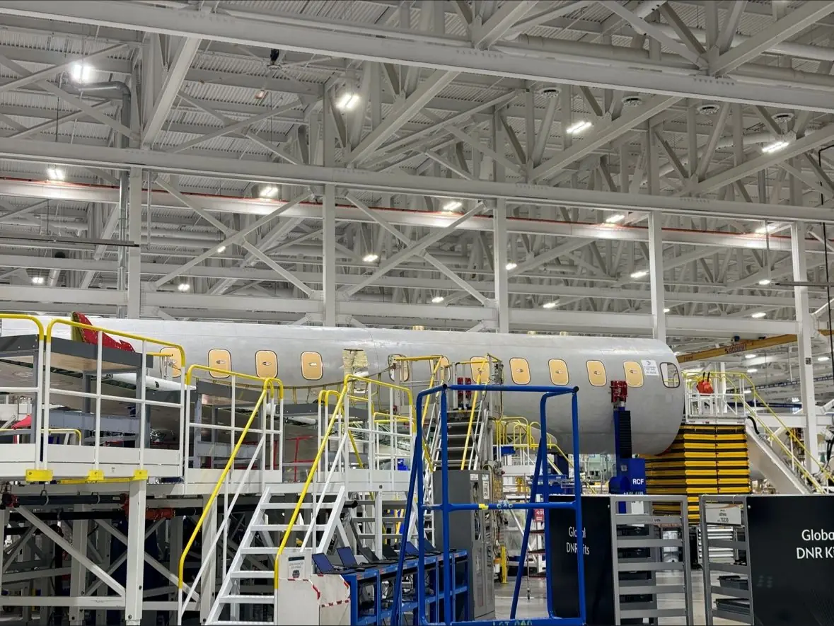 Complete aircraft fuselage staged for transport