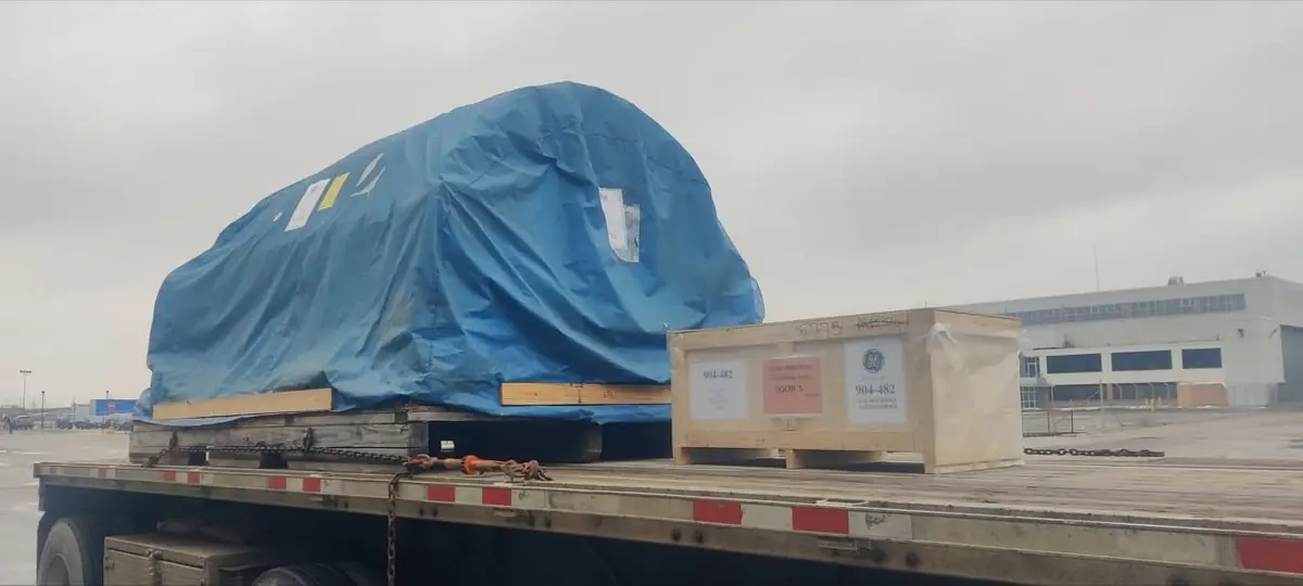 Jet engine secured on a Trans Link flatbed
