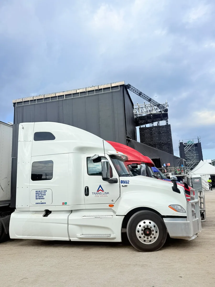 Trans Link truck 0552 parked backstage beside the main festival stage